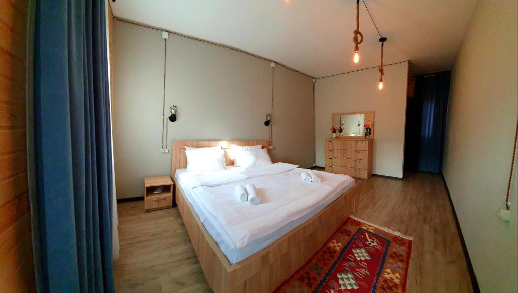 Letto o letti in una camera di Hotel Migu Yard