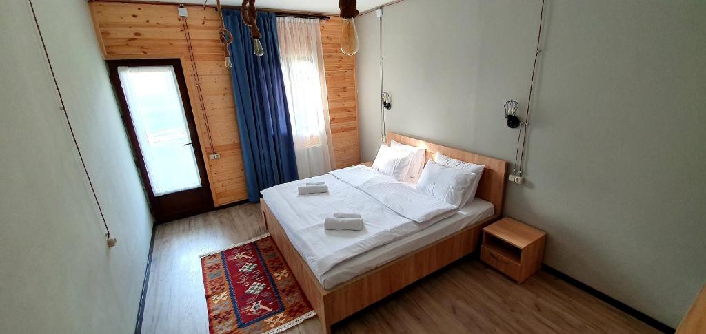 Letto o letti in una camera di Hotel Migu Yard