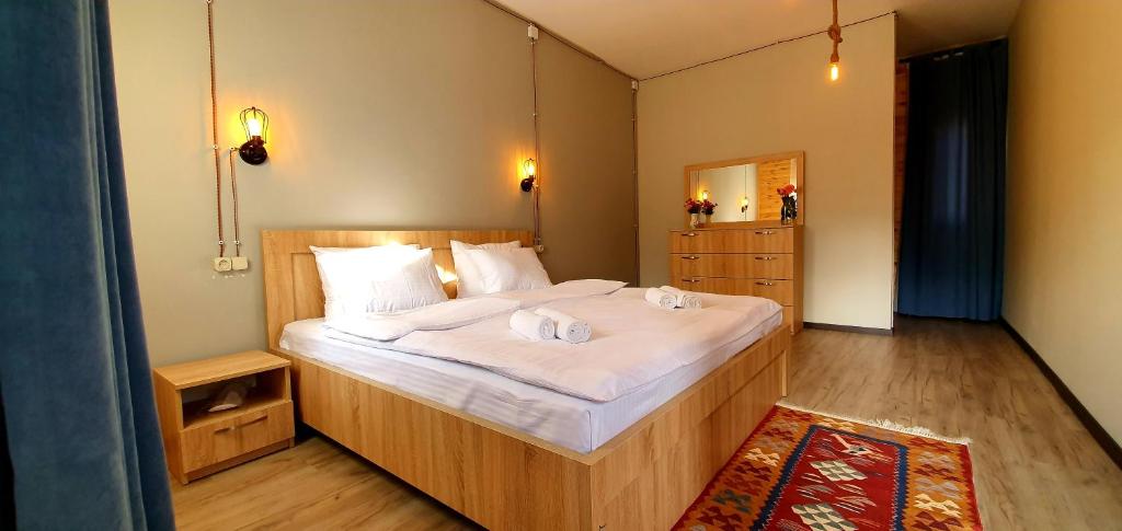 Letto o letti in una camera di Hotel Migu Yard
