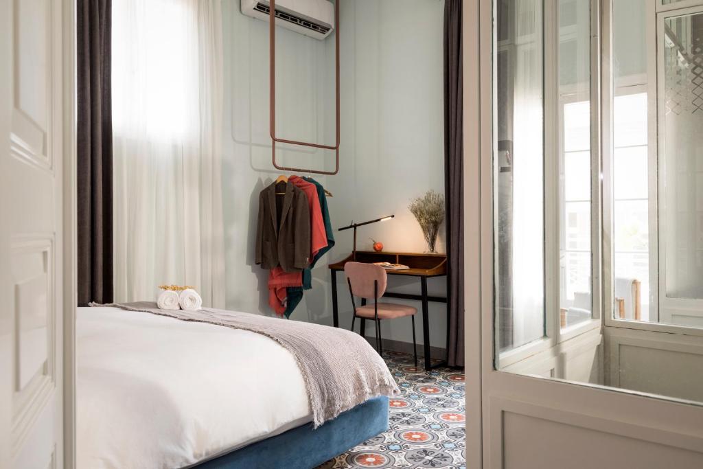 Postel nebo postele na pokoji v ubytování Hotel Lost Gemmayzeh