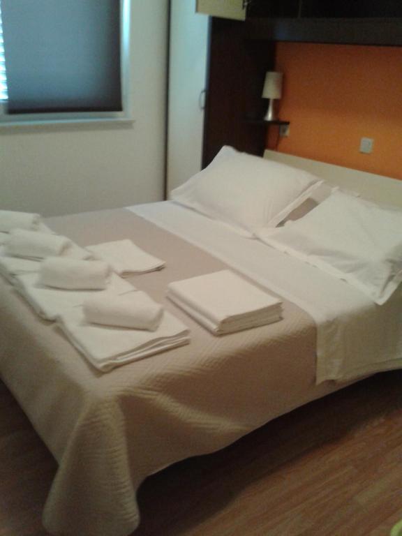 Posteľ alebo postele v izbe v ubytovaní Sea view apartman Antonio