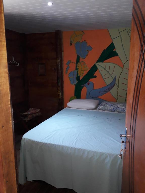 Postel nebo postele na pokoji v ubytování Hospedagem ocean view ilha g