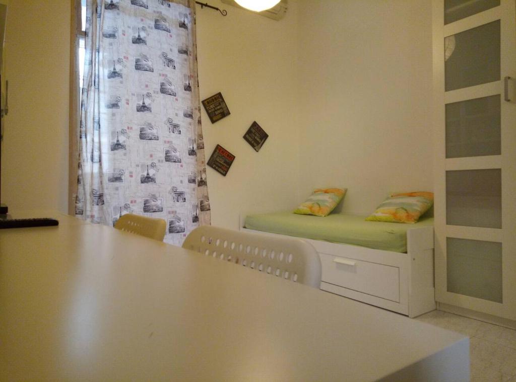 Ein Bett oder Betten in einem Zimmer der Unterkunft Campus House