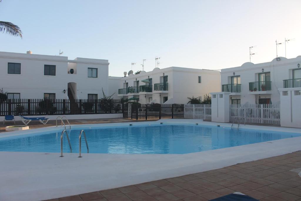 The swimming pool at or close to Magnifico apartamento en las dunas de corralejo