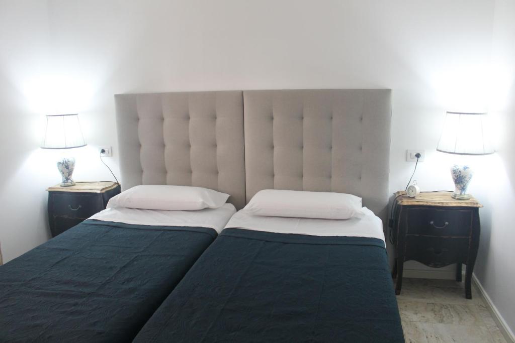 A bed or beds in a room at Magnifico apartamento en las dunas de corralejo