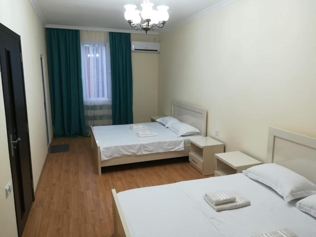 Postel nebo postele na pokoji v ubytování West House