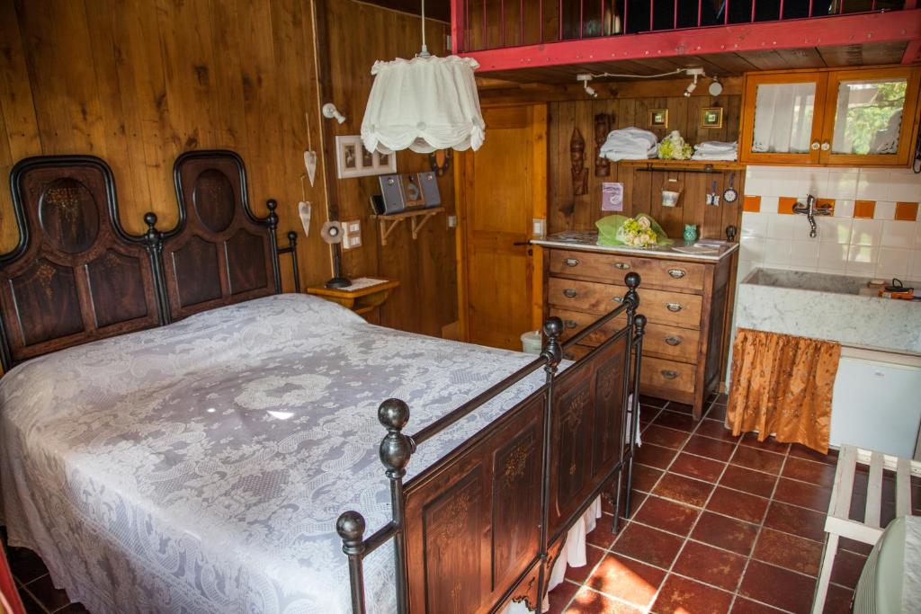 Postel nebo postele na pokoji v ubytování Magiche Langhe