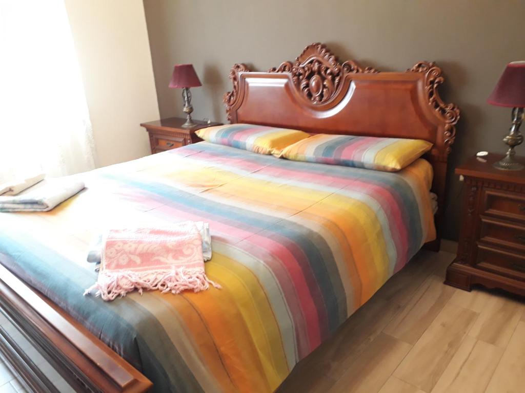 Postel nebo postele na pokoji v ubytování Casa di Ica