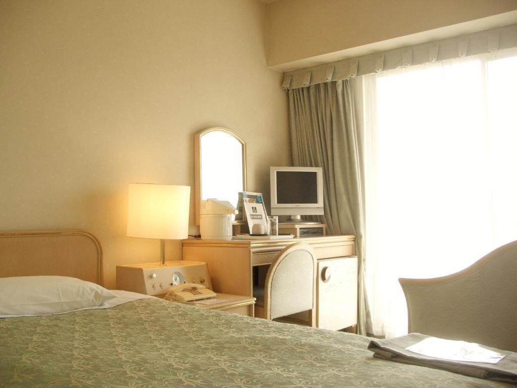 TV a/nebo společenská místnost v ubytování Hotel Heritage