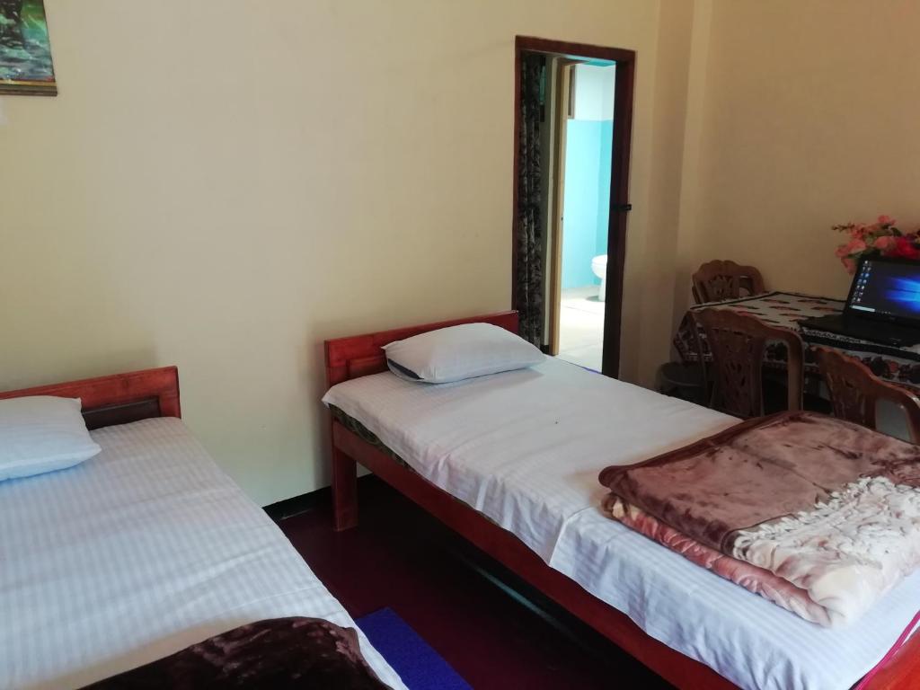 Postel nebo postele na pokoji v ubytování Hello Super Hostel
