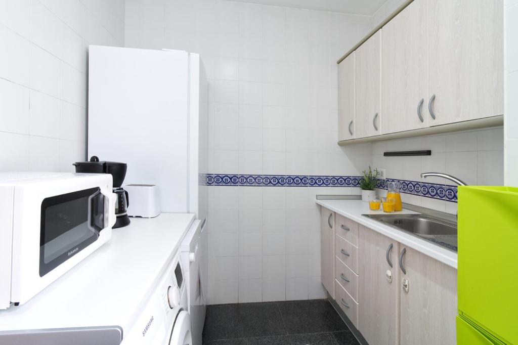 Kuchyň nebo kuchyňský kout v ubytování Spacious centre apartment in Málaga