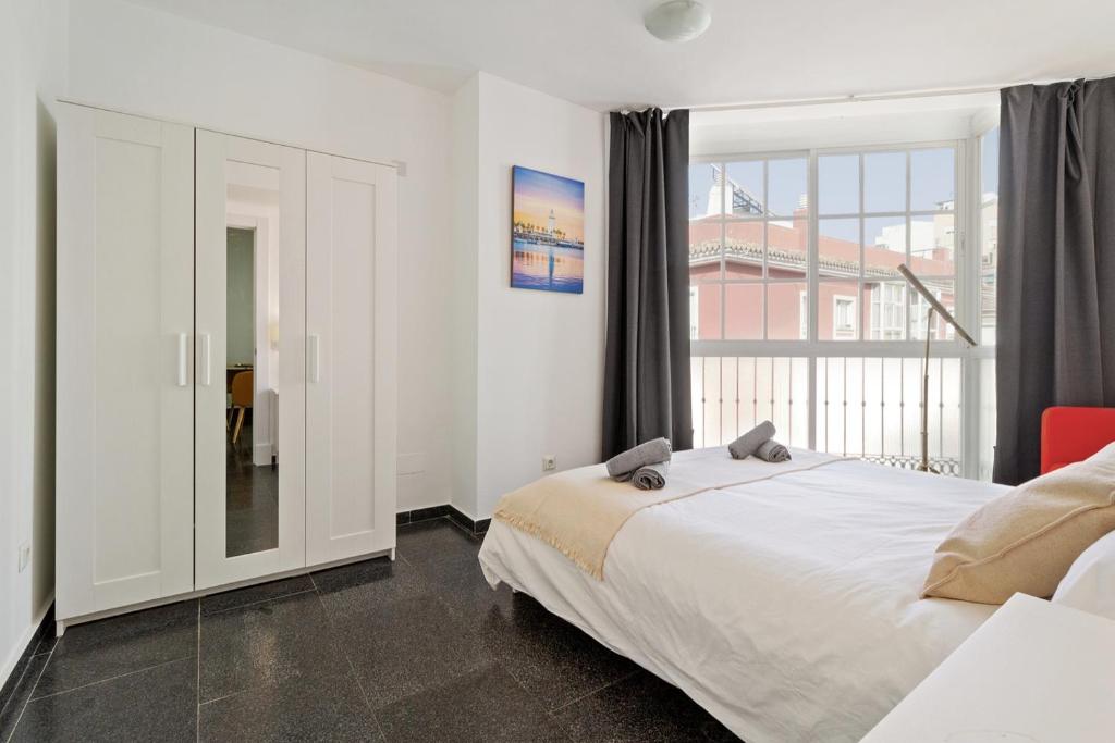 Postel nebo postele na pokoji v ubytování Spacious centre apartment in Málaga