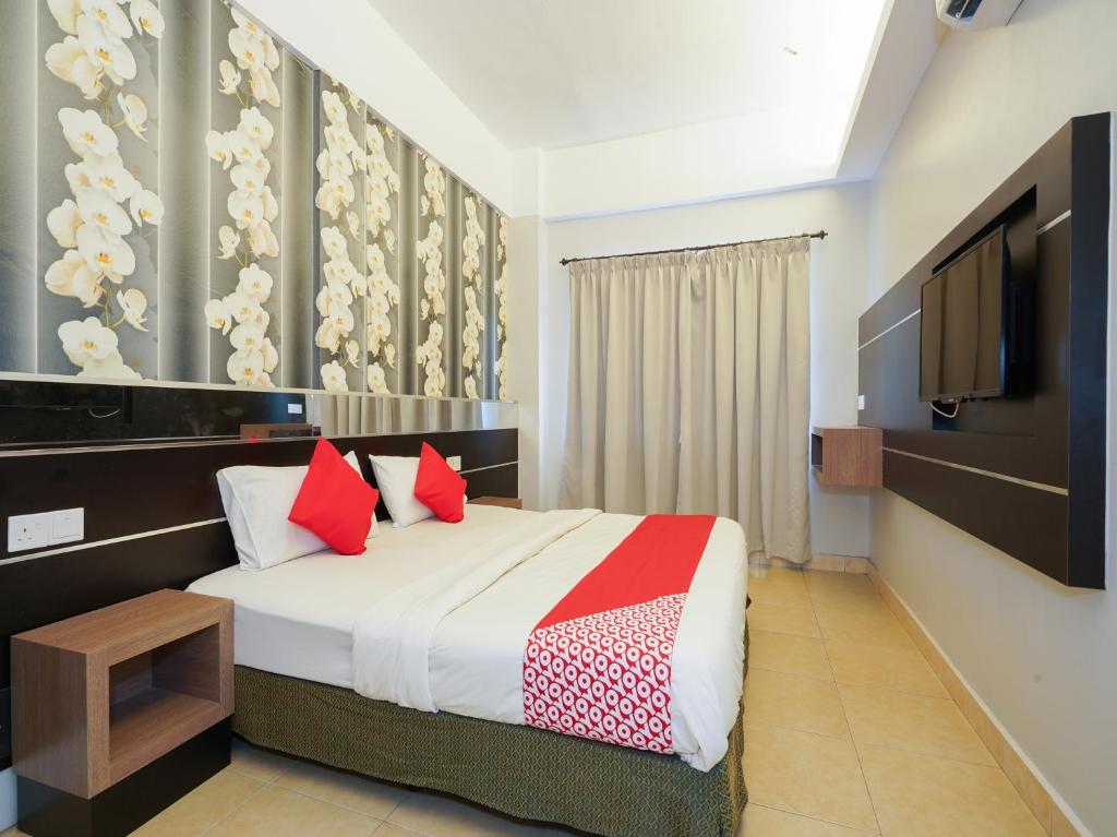 Легло или легла в стая в Super OYO 44083 Hotel Orchard Inn