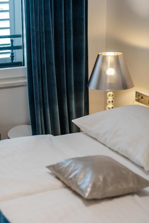 Posteľ alebo postele v izbe v ubytovaní Luxury rooms Paula