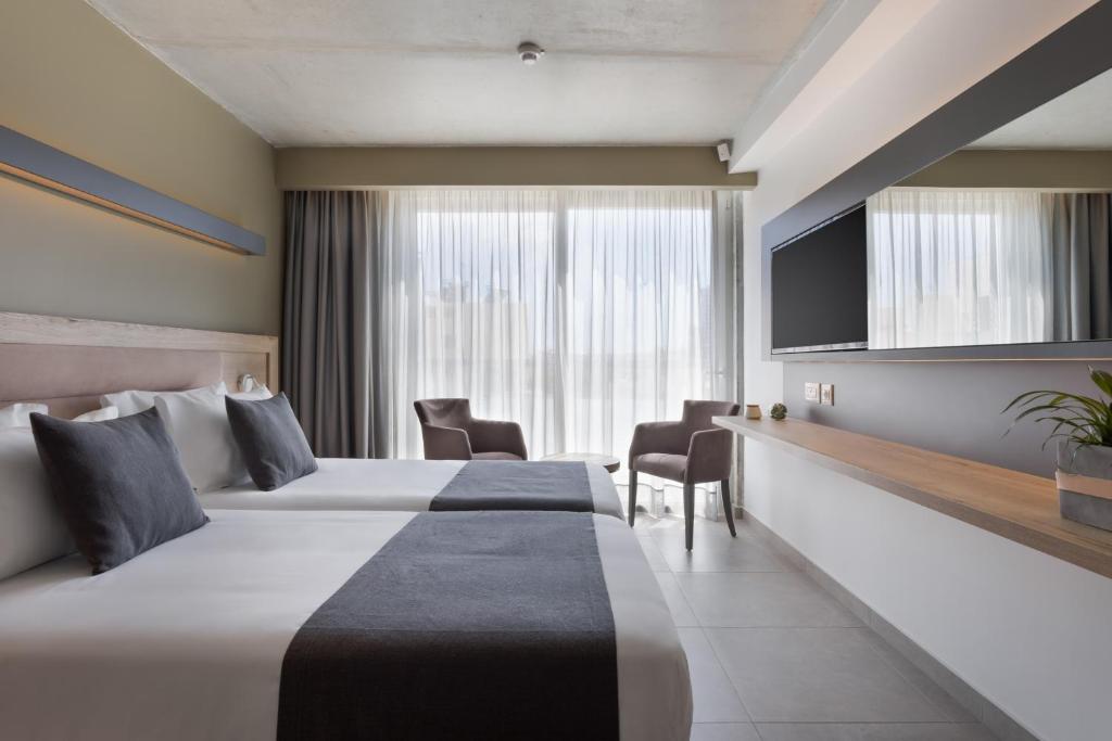 Postel nebo postele na pokoji v ubytování Azur Hotel by ST Hotels