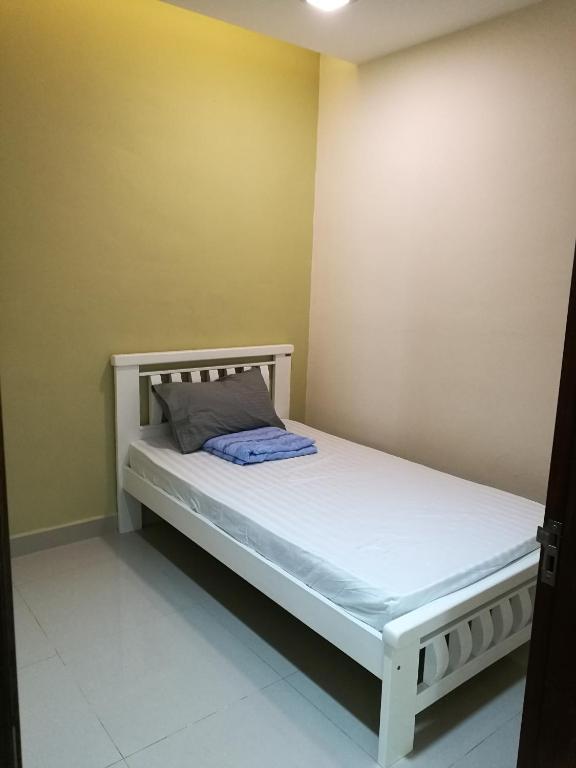 Postel nebo postele na pokoji v ubytování EJ Guesthouse