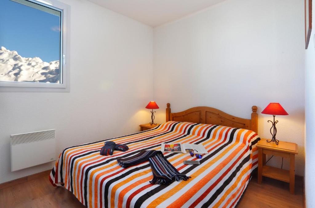 Posteľ alebo postele v izbe v ubytovaní Résidence Néméa Le Hameau de Balestas