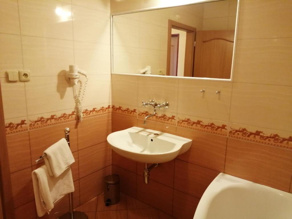Koupelna v ubytování HOTEL SAN