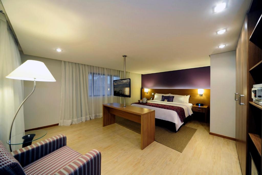 Postel nebo postele na pokoji v ubytování Radisson Hotel Belém