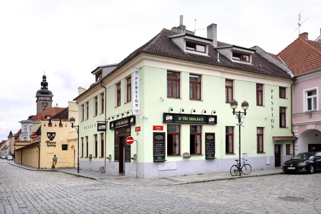 a building on the side of a street at Pension U Tří sedláků in České Budějovice