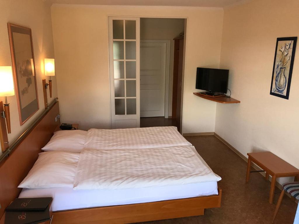 Postel nebo postele na pokoji v ubytování Gasthaus Beinker