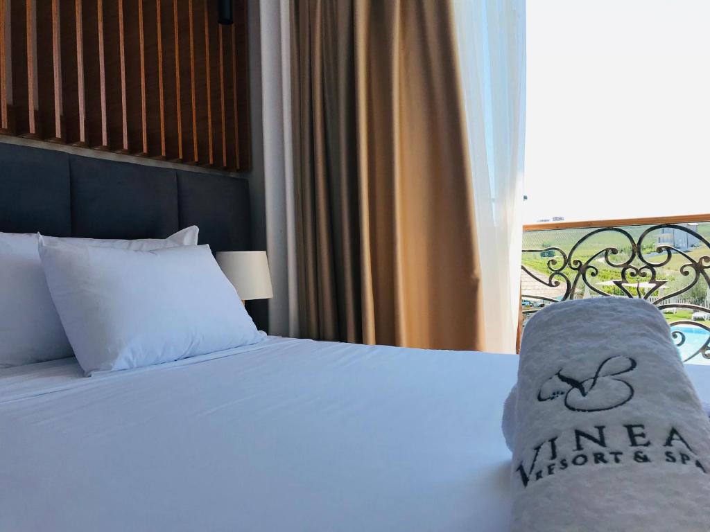 Postel nebo postele na pokoji v ubytování Vinea Resort