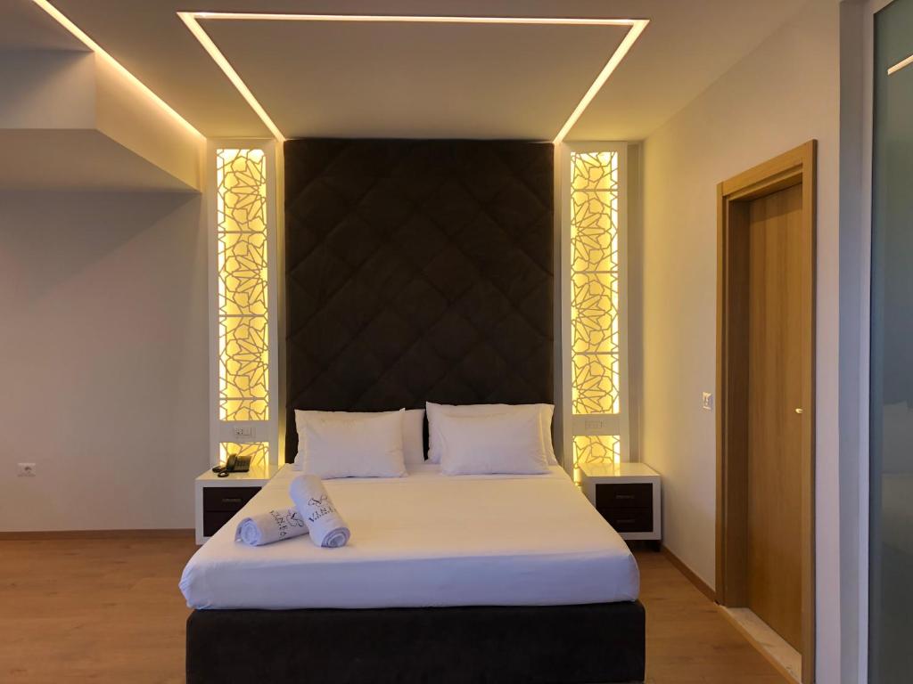 Postel nebo postele na pokoji v ubytování Vinea Resort