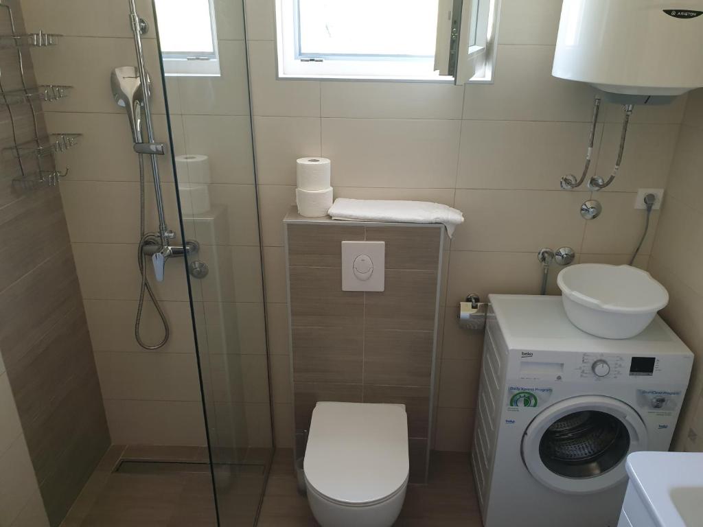 Koupelna v ubytování APARTMENTS TOMIĆ
