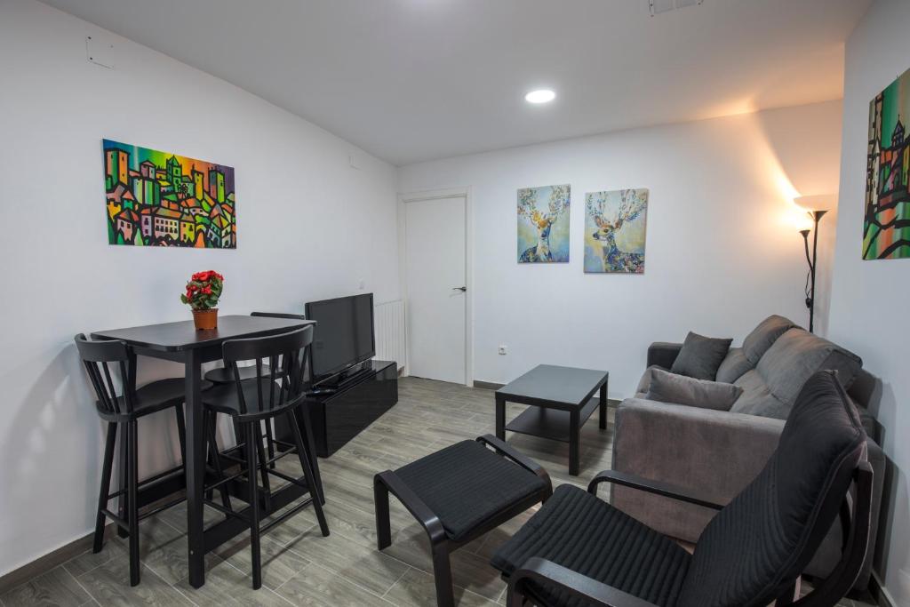 Posezení v ubytování Apartamentos Cáceres Turístico