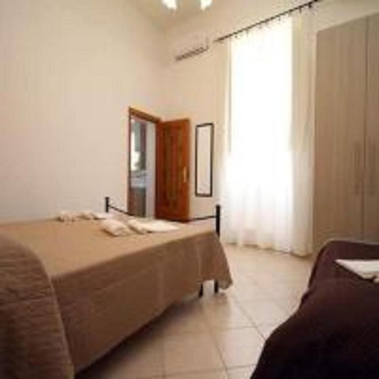 Postel nebo postele na pokoji v ubytování Casa Antica