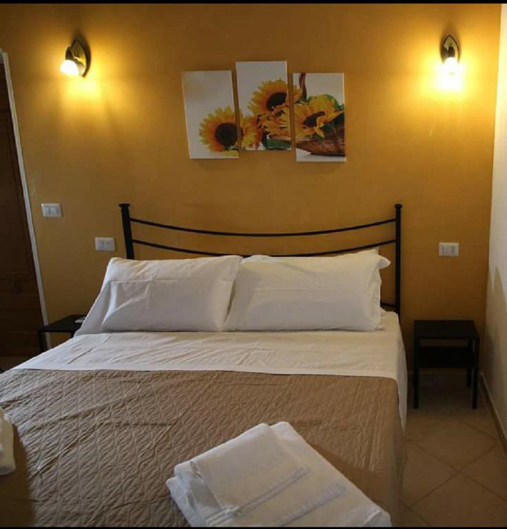 Postel nebo postele na pokoji v ubytování Casa Antica