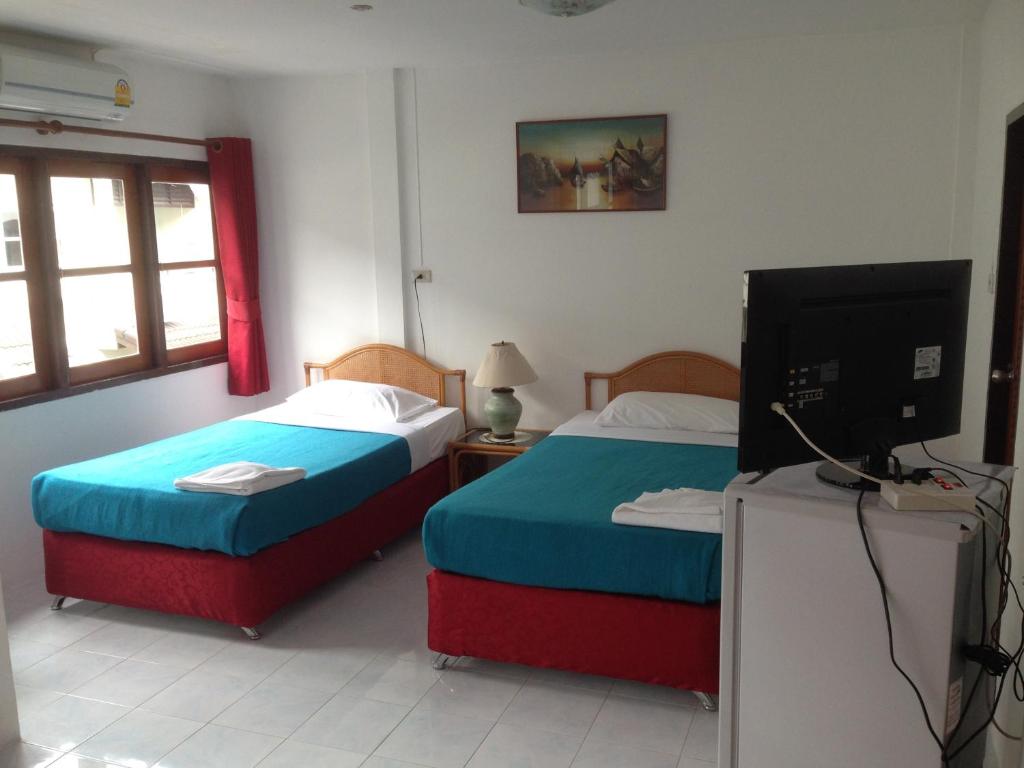 Postel nebo postele na pokoji v ubytování A&B Hotel