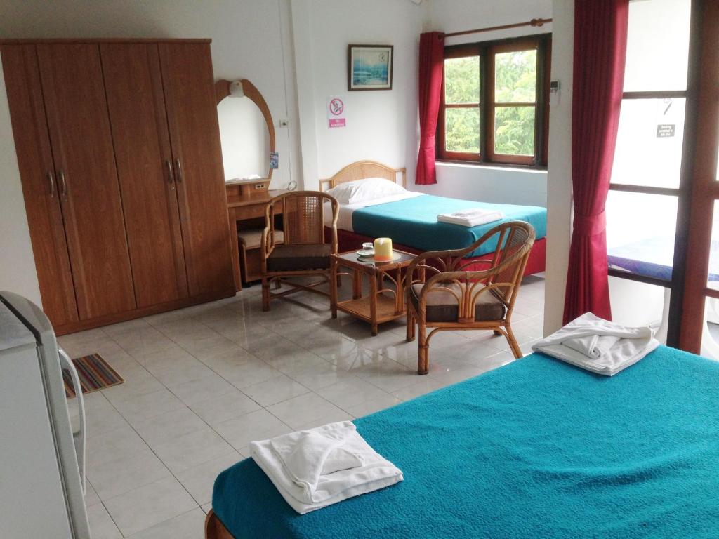 Postel nebo postele na pokoji v ubytování A&B Hotel