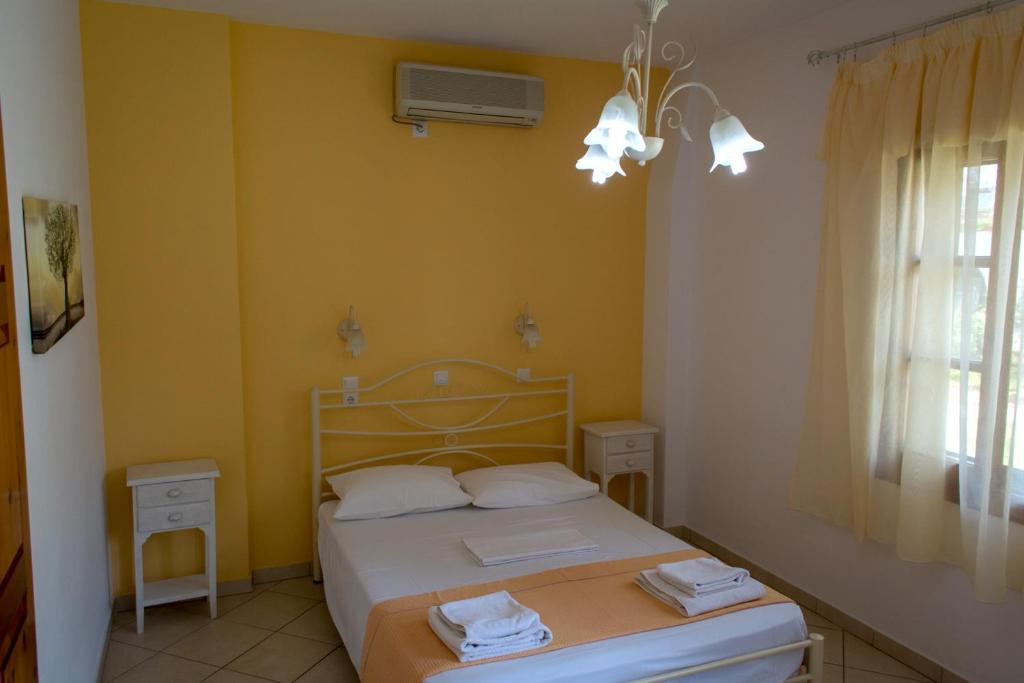 Postel nebo postele na pokoji v ubytování Villa Molos