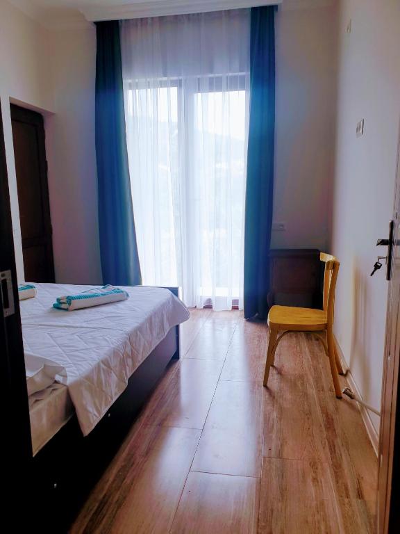 Postel nebo postele na pokoji v ubytování Four Seasons in Kutaisi