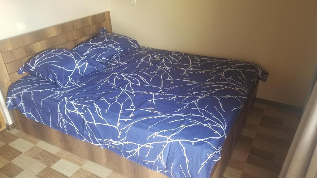 Postel nebo postele na pokoji v ubytování Grigoleti Relax Cottage