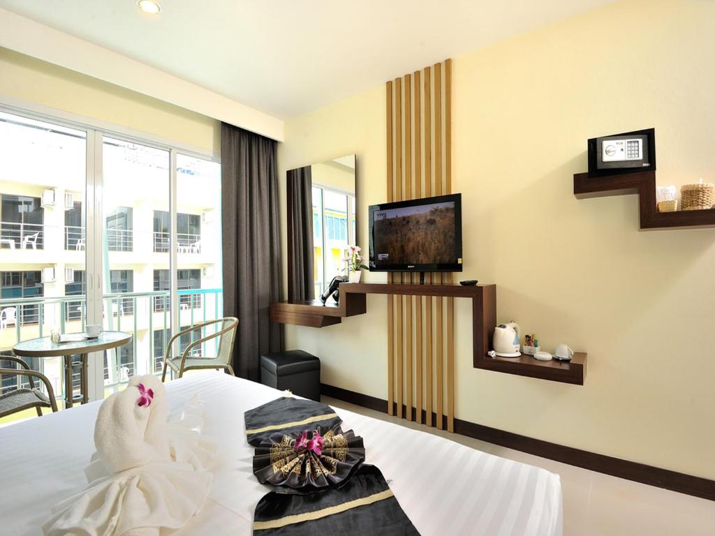 TV a/nebo společenská místnost v ubytování Pimrada Hotel
