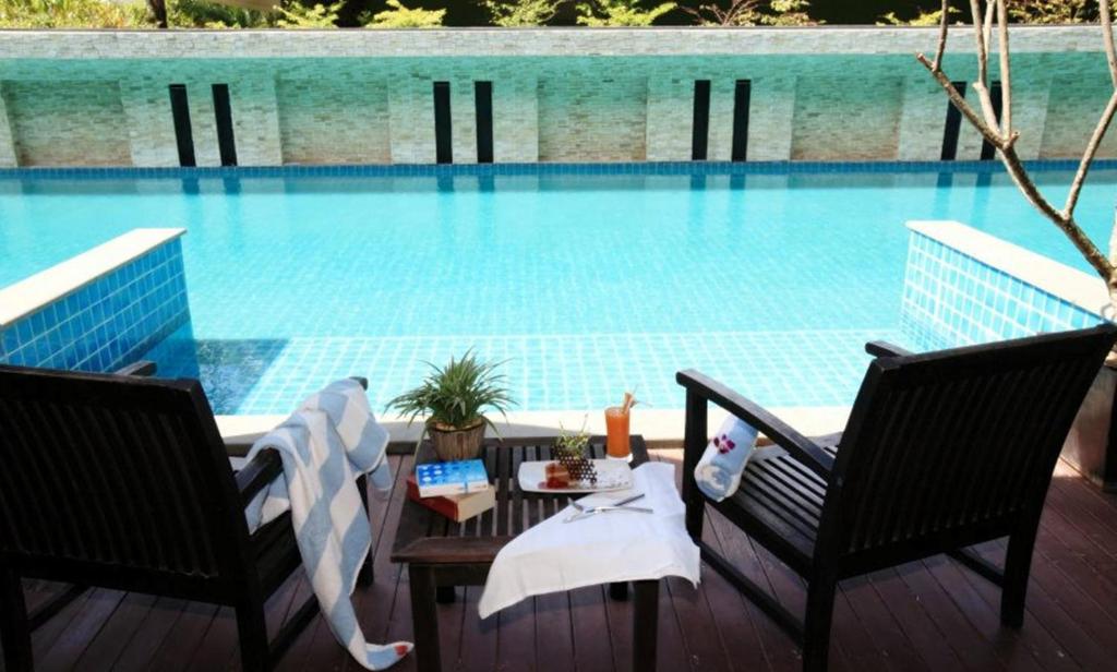Бассейн в Mercure Koh Chang Hideaway или поблизости