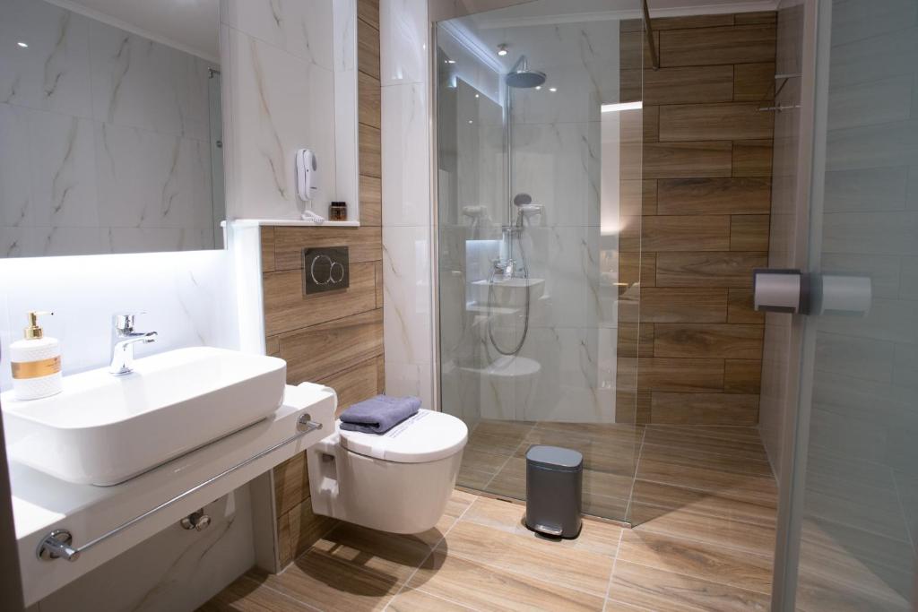Łazienka w obiekcie Marvel Deluxe Rooms