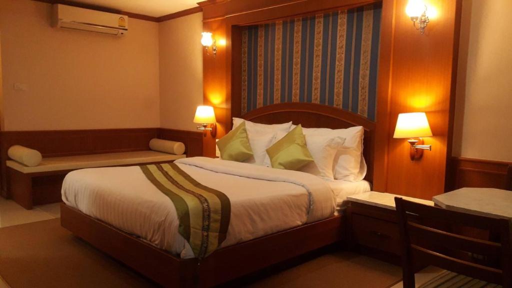 Cama o camas de una habitación en The Lion King Hotel Udonthani