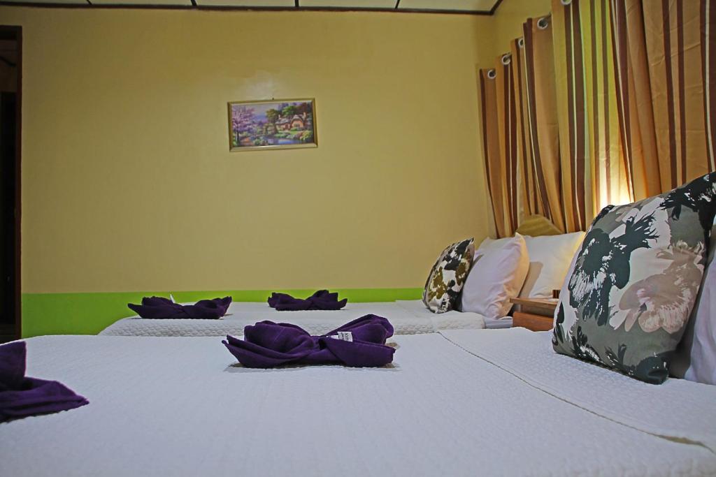 Postel nebo postele na pokoji v ubytování Hwan Dynasty Suite