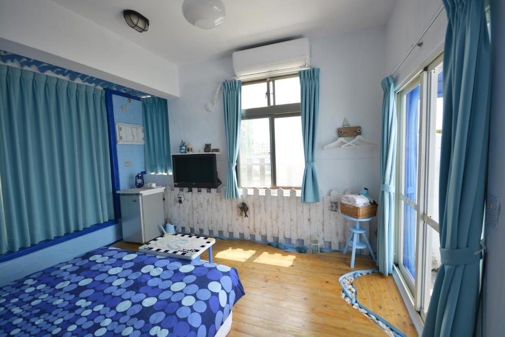 Postel nebo postele na pokoji v ubytování Sea House