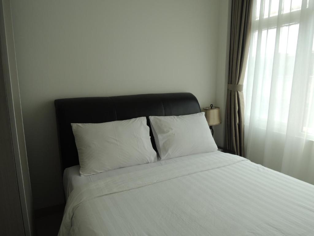 Postel nebo postele na pokoji v ubytování Hotel 55
