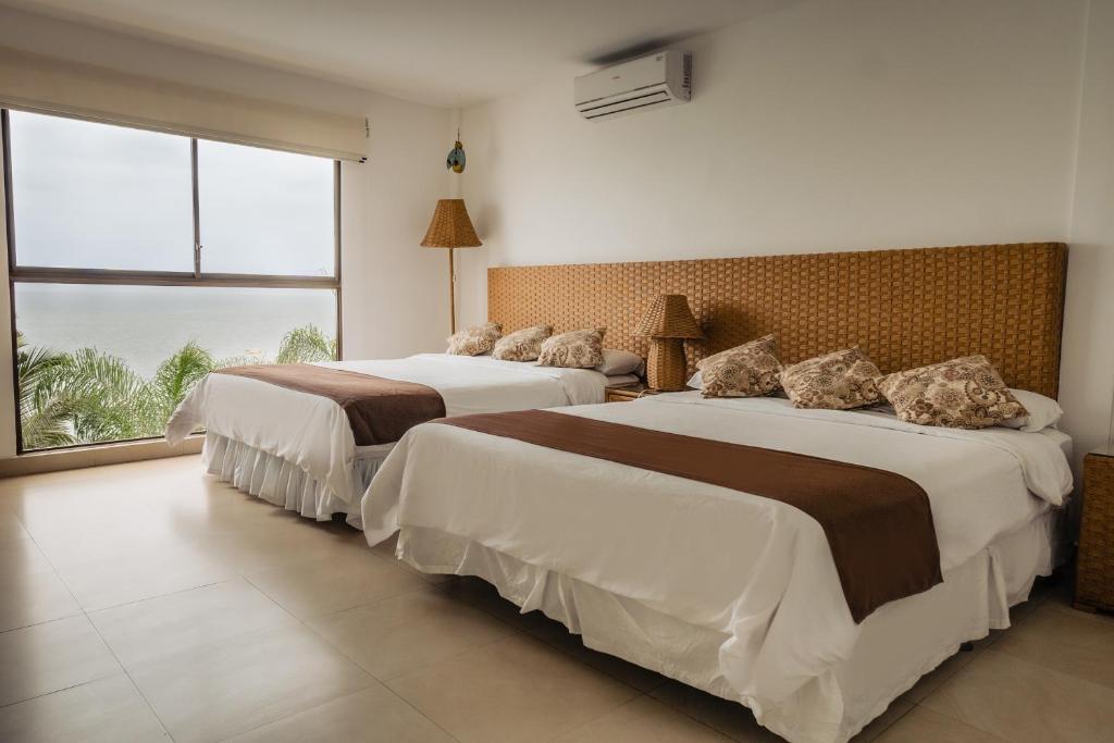 Postel nebo postele na pokoji v ubytování Hotel Vistalmar