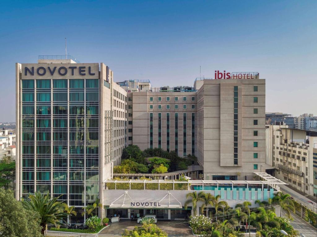 a view of the novo hotel in a city at ibis Bengaluru Outer Ring Road in Bangalore