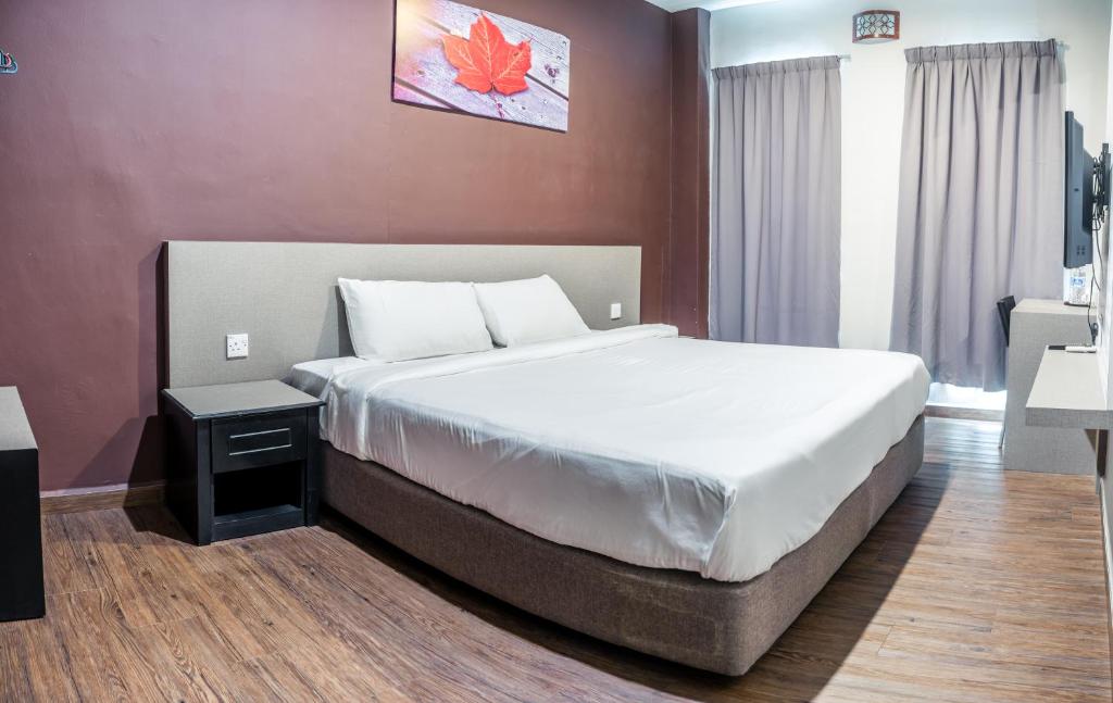Postel nebo postele na pokoji v ubytování K West Hotel