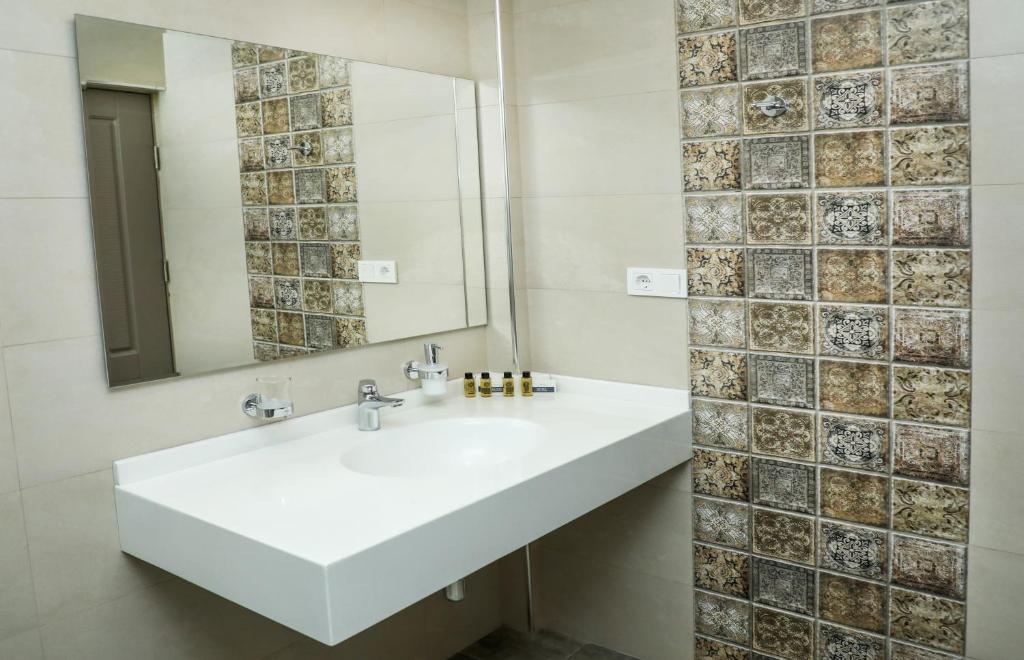 Koupelna v ubytování Teryan Pushkin Apart Hotel