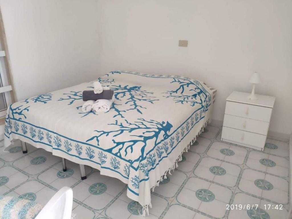 Кровать или кровати в номере Rosa Marina Frontline Beach