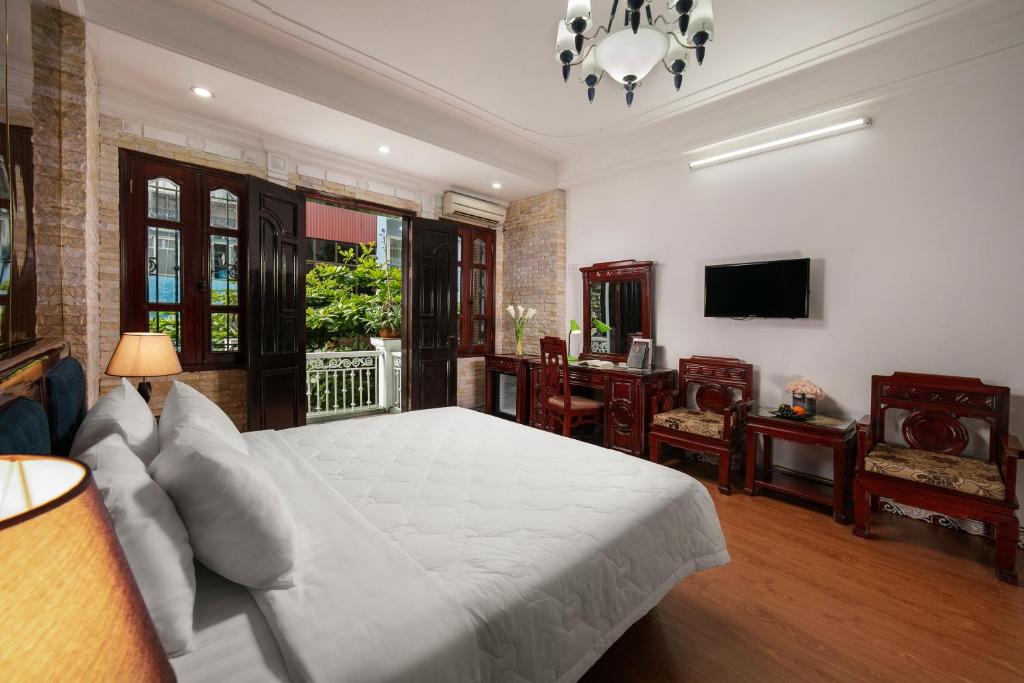 TV a/nebo společenská místnost v ubytování Little Diamond Hotel