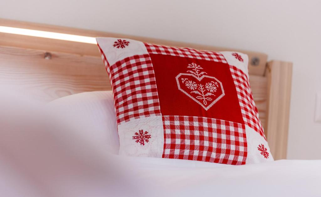 Postel nebo postele na pokoji v ubytování Hotel Belalp